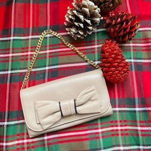 Kate spade wallet with large bow and gold chain